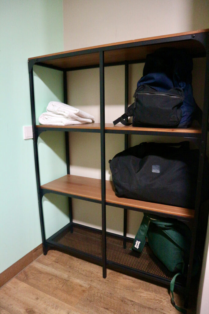 Large shelving rack with baggage on