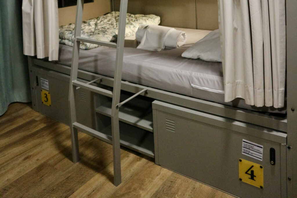 Base of bunk beds with shelving unit