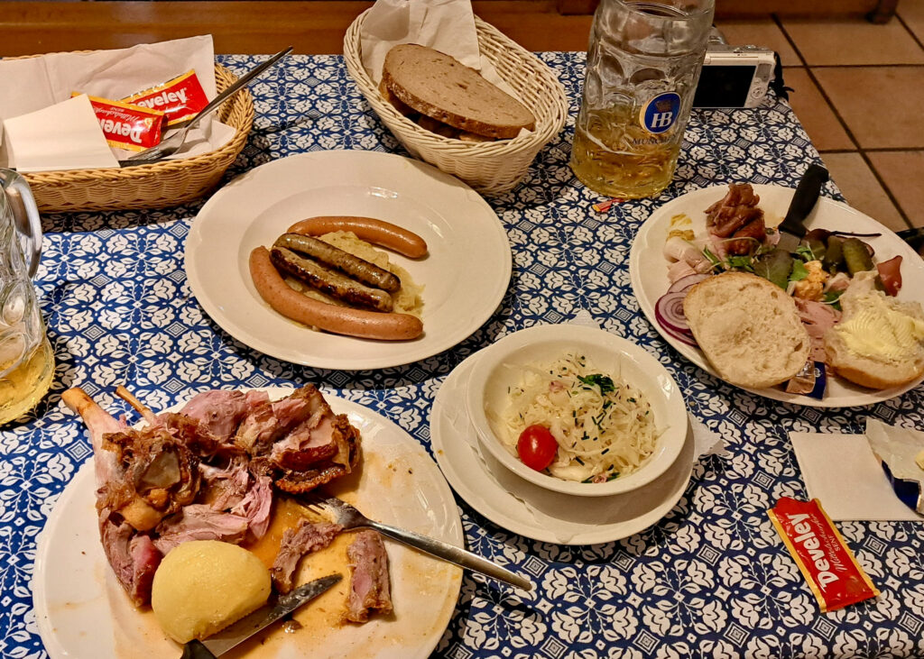 Table with various traditional Bavarian dishes on