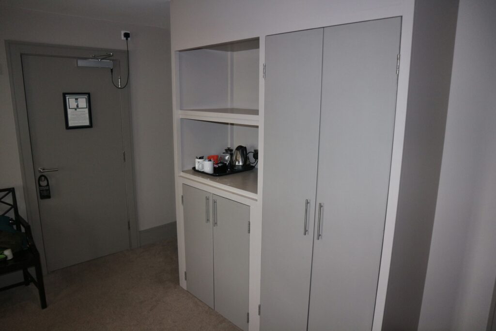 Large wardrobe doors with coffee making facilities