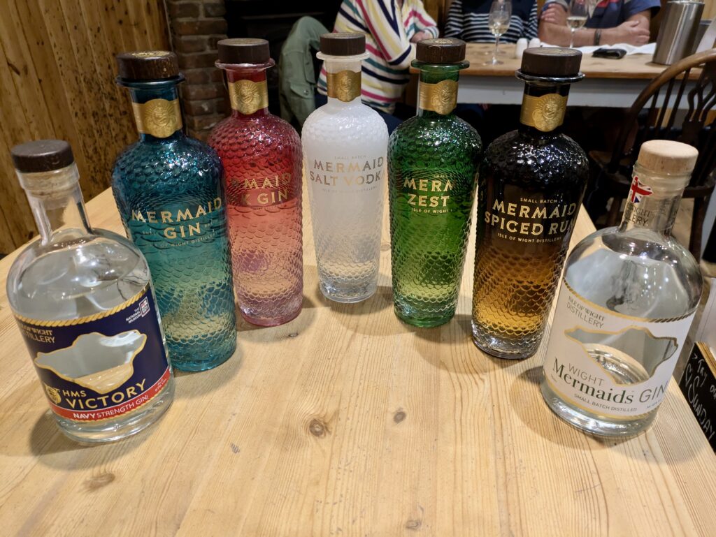 An array of multicoloured bottles from the mermaid gin company on the Isle of Wight